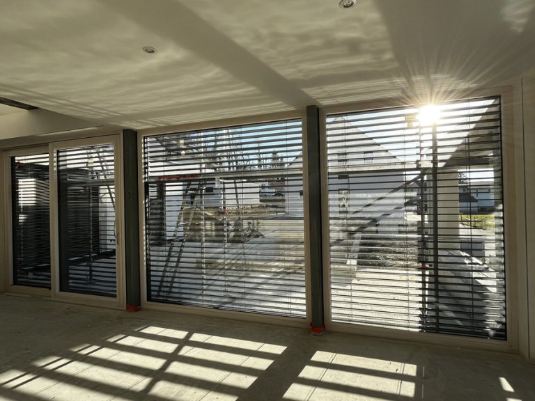 Fenêtre bois aluminium avec BSO à Zillisheim par Technilux